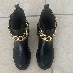 Chic Black Ankle Boots with Gold Chain Accent